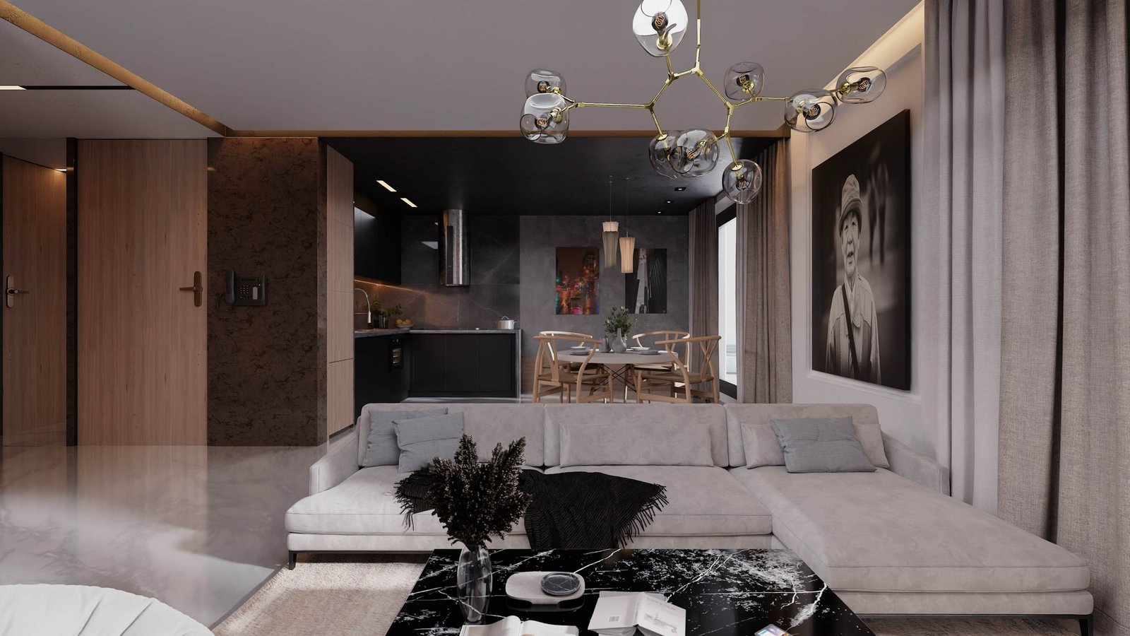 Living and dining room with a grey sectional, black marble table and brass globe chandelier